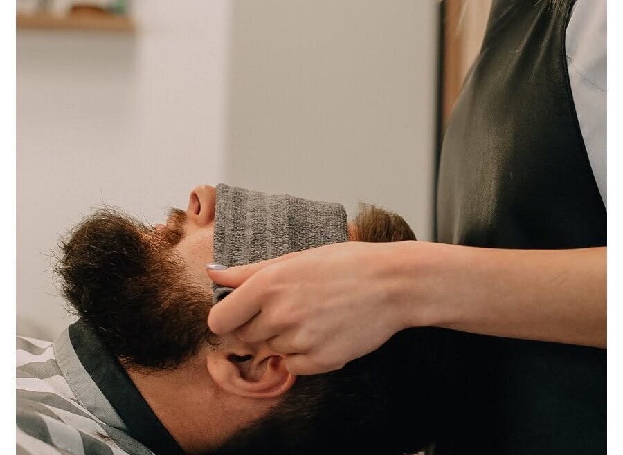 Hot towel treatment before a shave